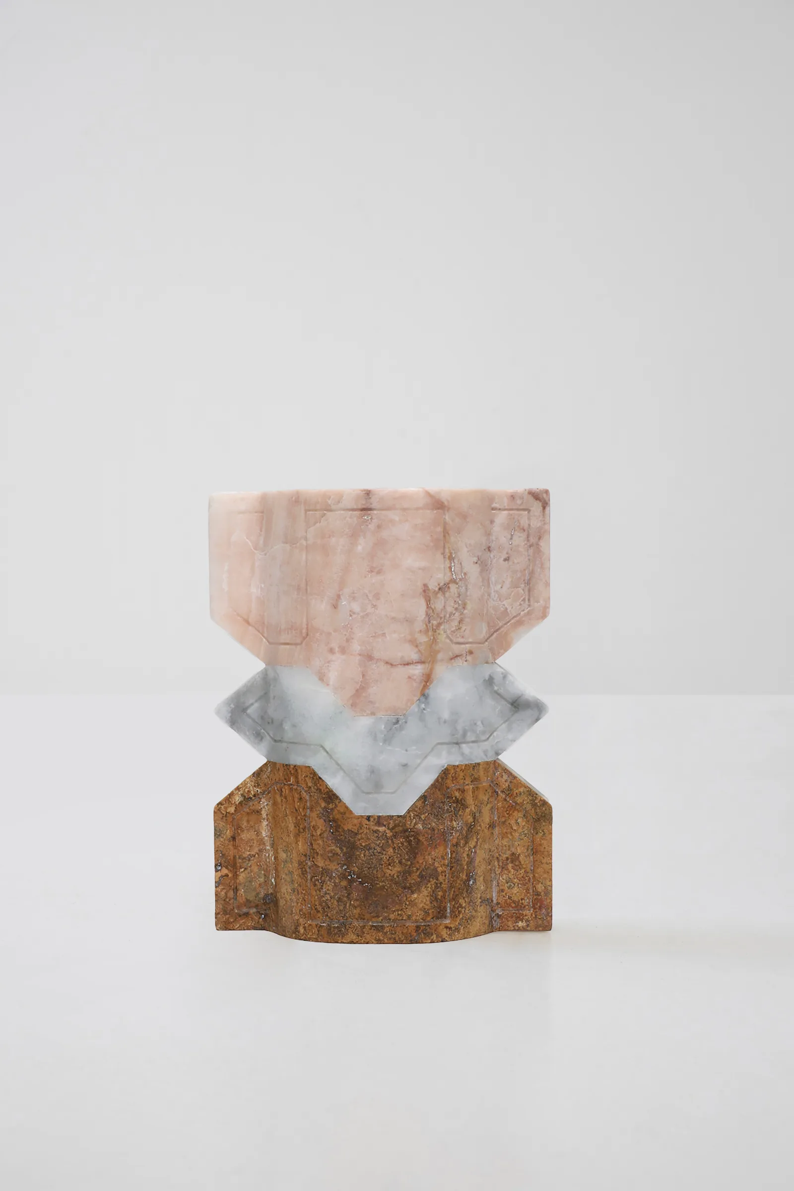Místico II.II vase in pink onyx, venetian marble, red travertine — view of the work