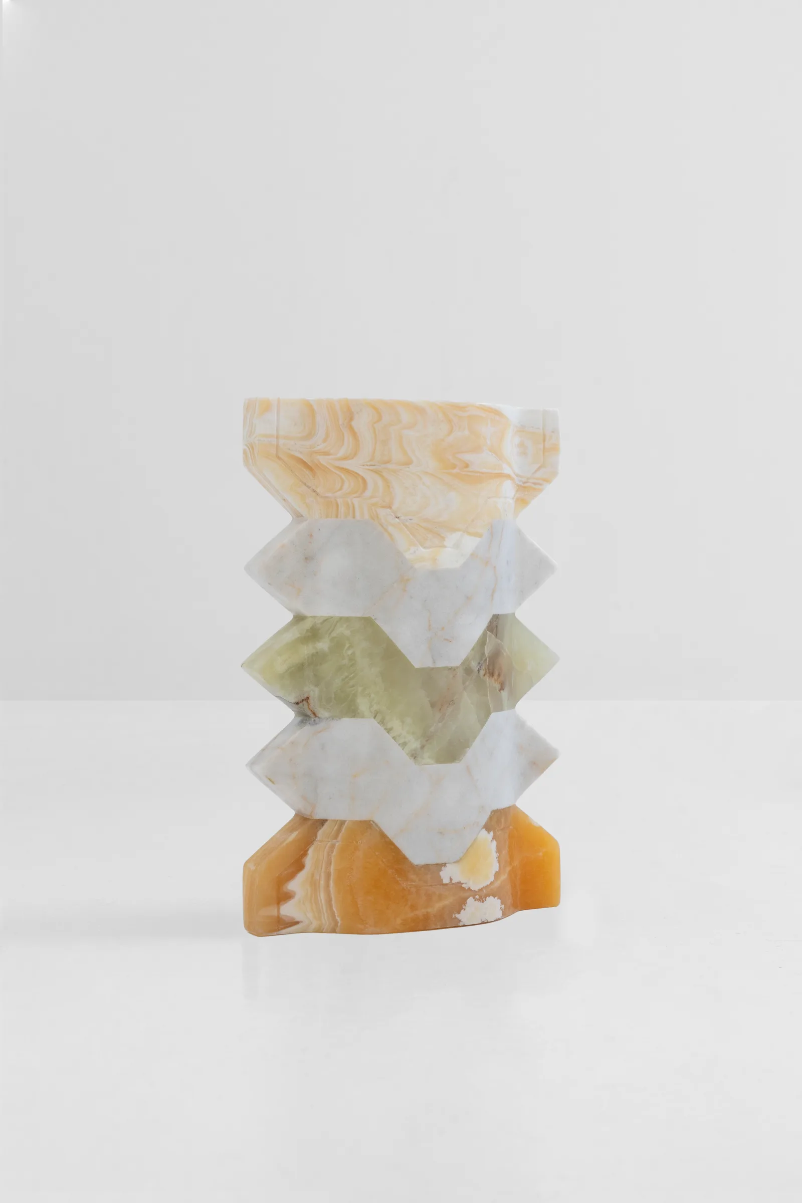 Místico III.I vase in pineapple onyx, venetian marble, talan green onyx — exhibition view