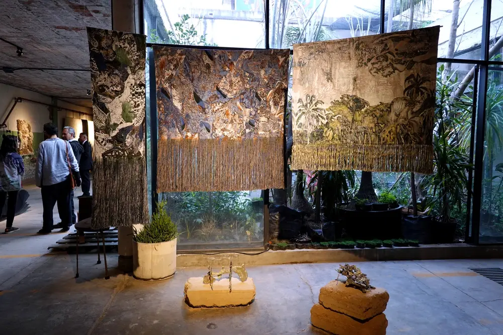 Exhibition view at ZonaMaco Mexico with textile and geological artworks