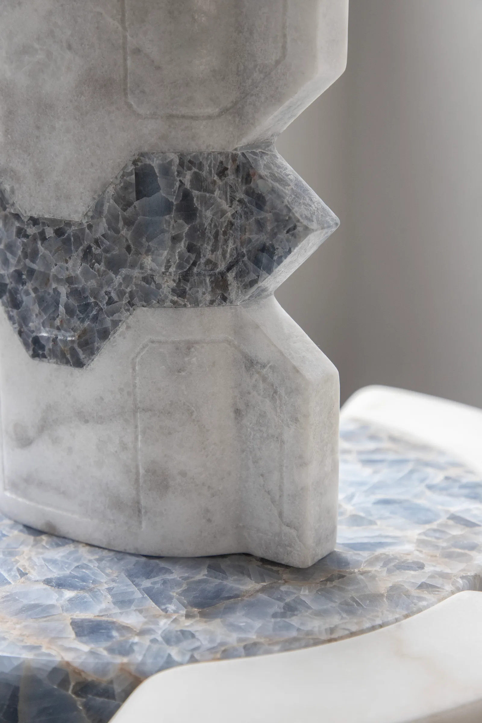 Místico II.III vase in venetian marble, blue calcite — exhibition view