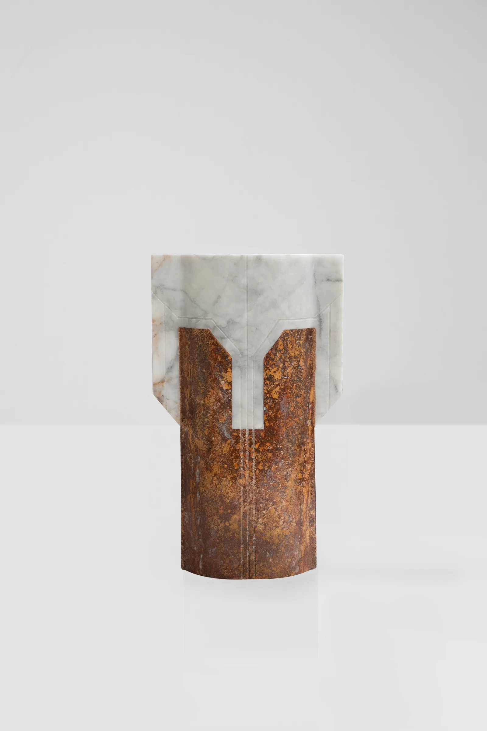 Místico IV.II vase in venetian marble, red travertine — exhibition view