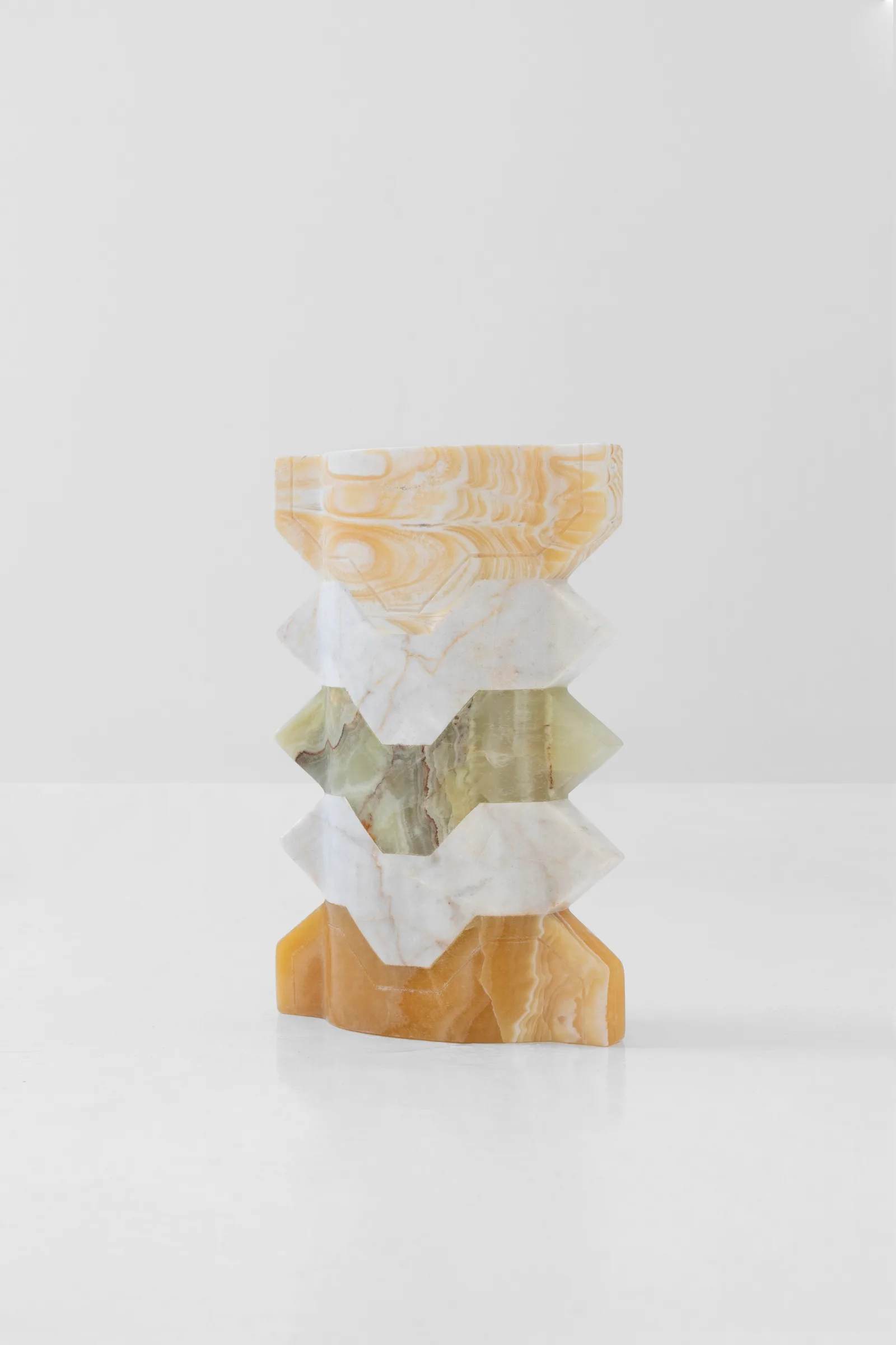 Místico III.I vase in pineapple onyx, venetian marble, talan green onyx — exhibition view