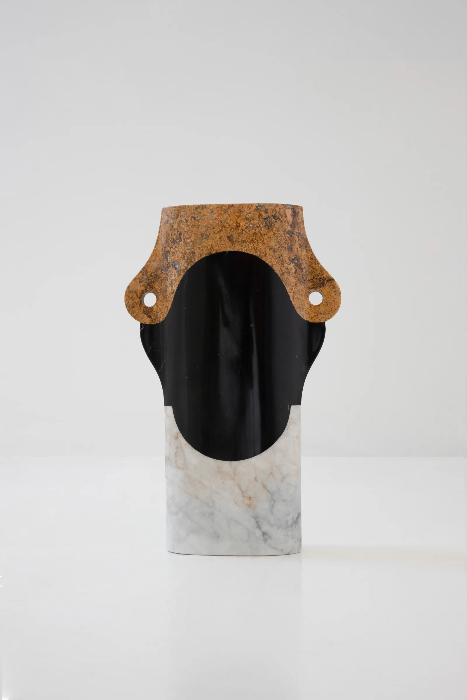 Abstracted Ancestry II.I vase in venetian marble, orizaba black marble, red travertine — view of the work