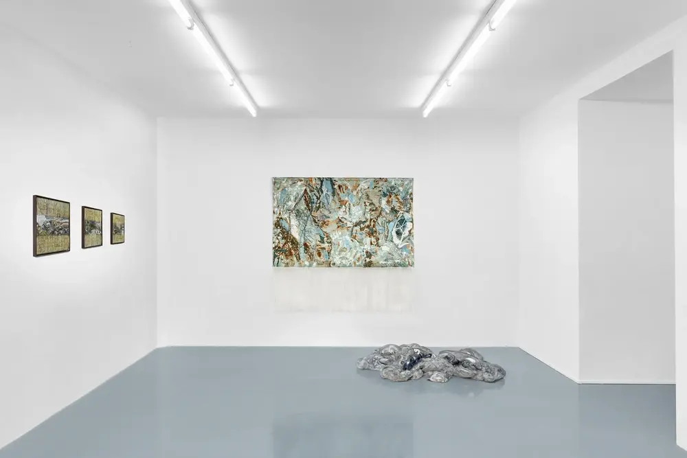 Exhibition view, biodiversity, large embroidered fringe tapestry, glass and fiber cocoon sculptures.