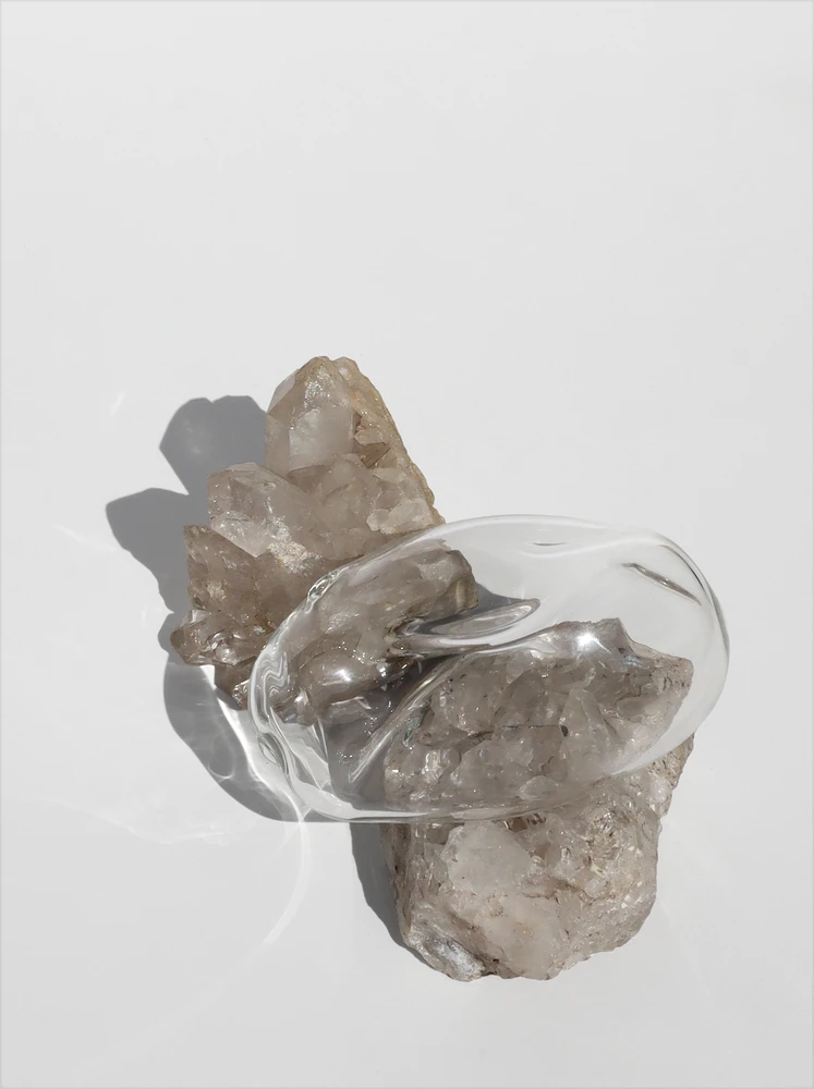 Blown glass sculpture incorporating crystalline formation, mineral materiality