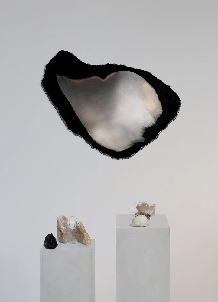 Silvered obsidian wall sculpture, glass sculptures, mineral specimens