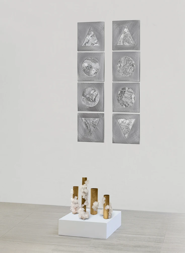 Exhibition view, post-nature geology, engraved panels, brass-crystal sculptures