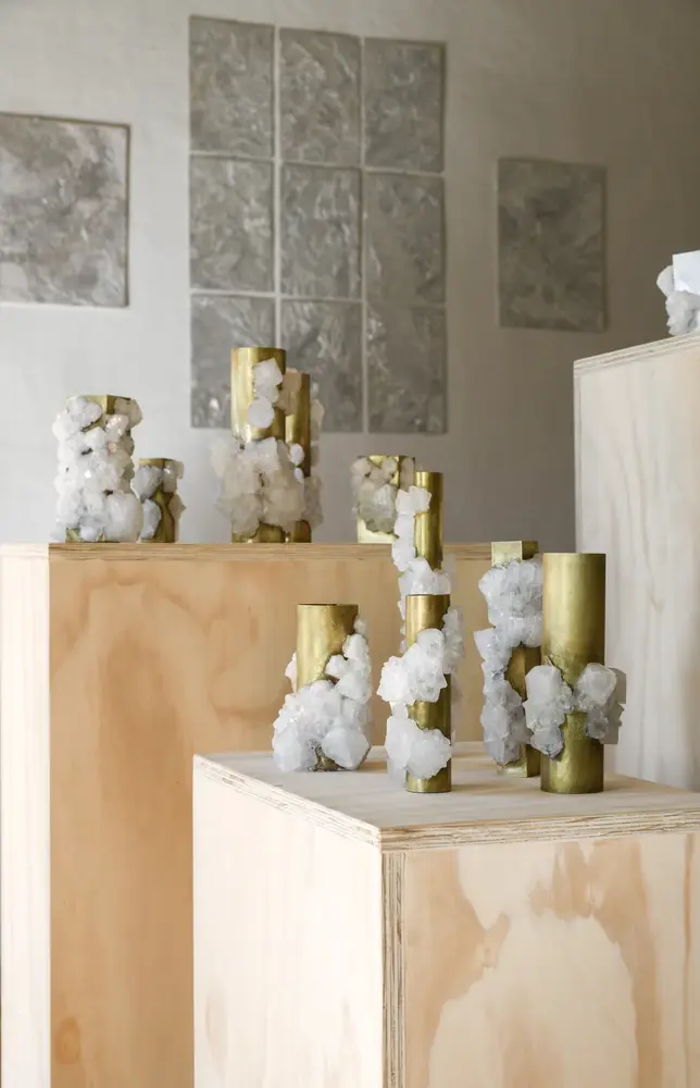 Exhibition view with upcycled material sculptures at Como Lake Festival